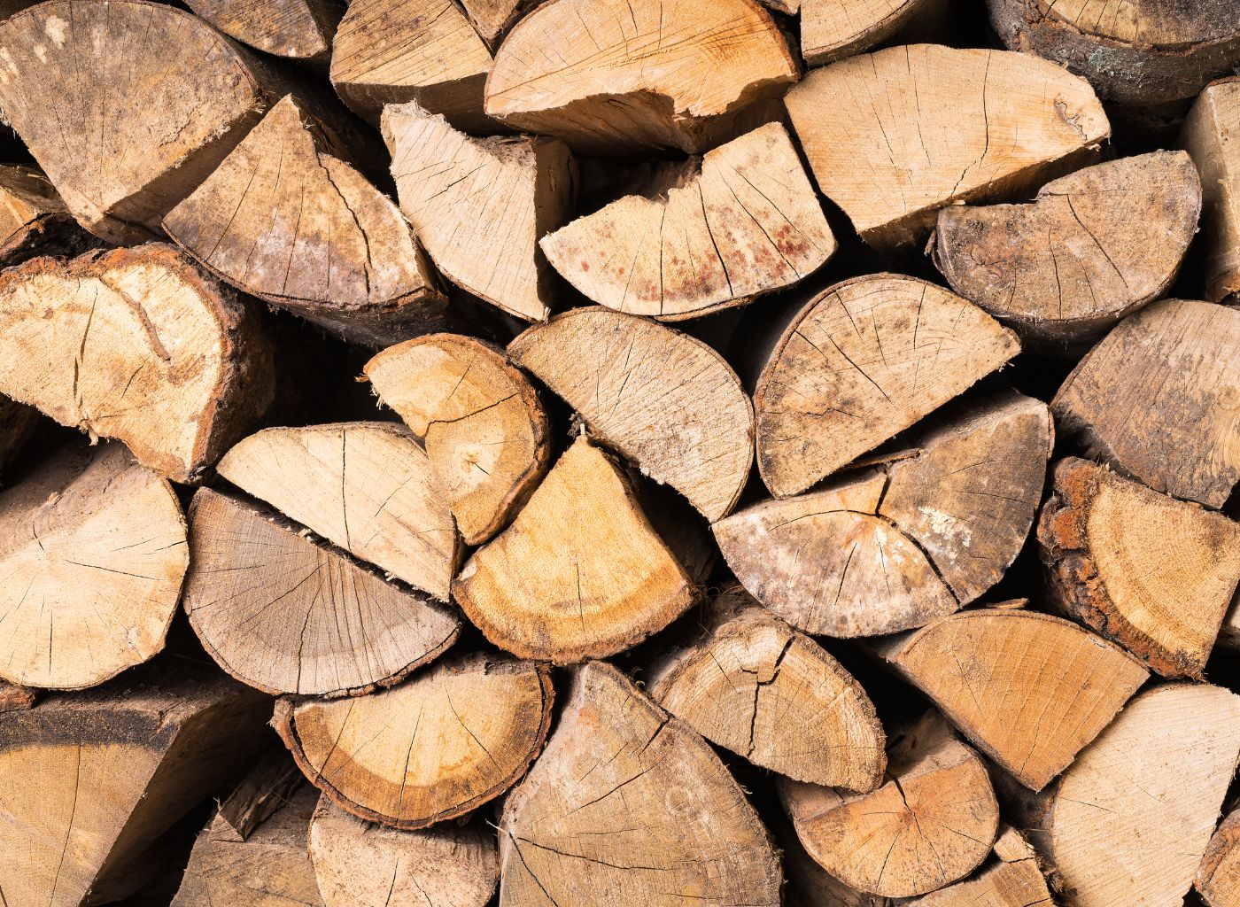 stacked seasoned oak firewood logs